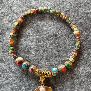 Armband elastic bunt gold mit Muschel