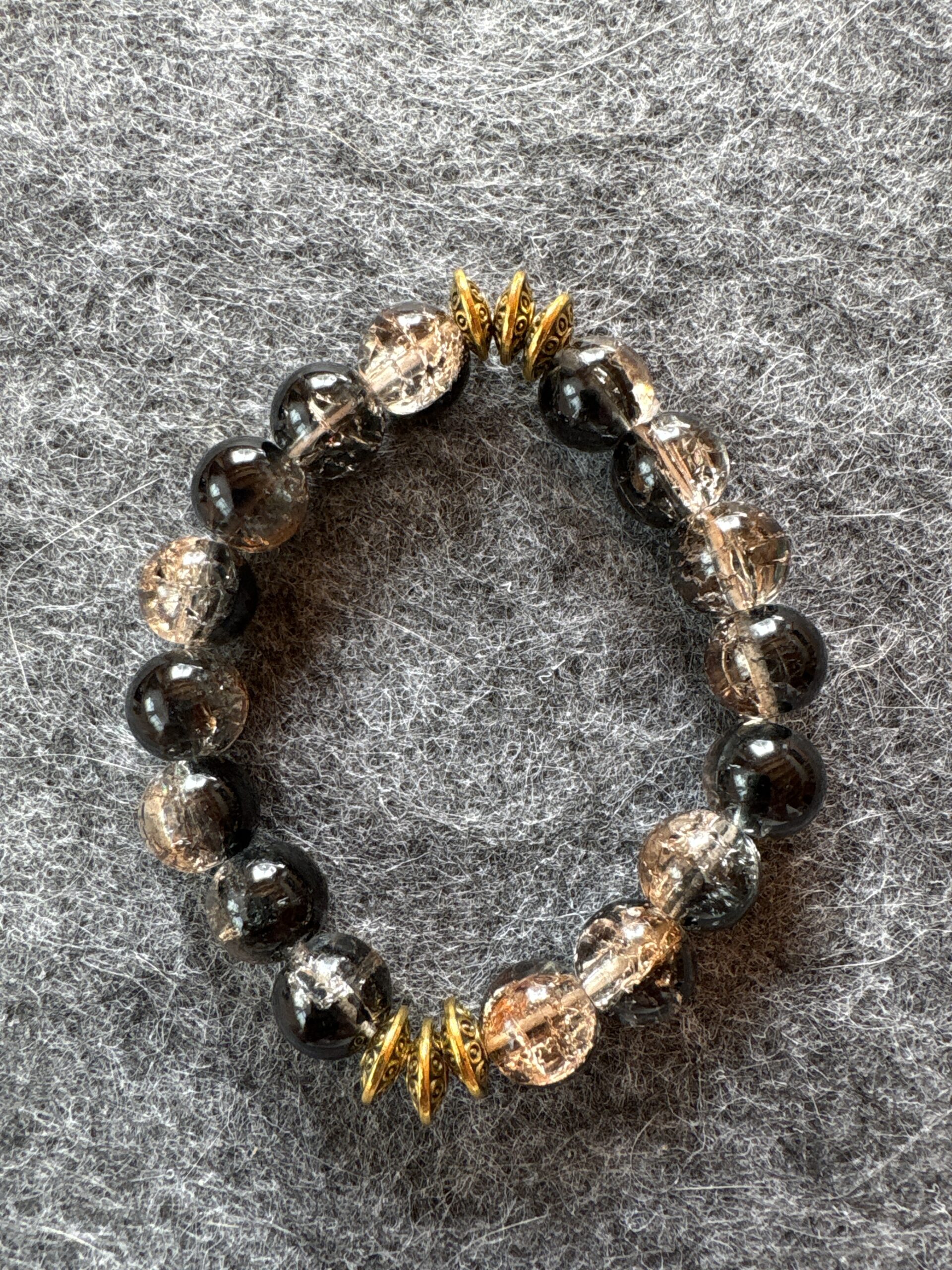 Armband elastic Glasperlen schwarz-gold
